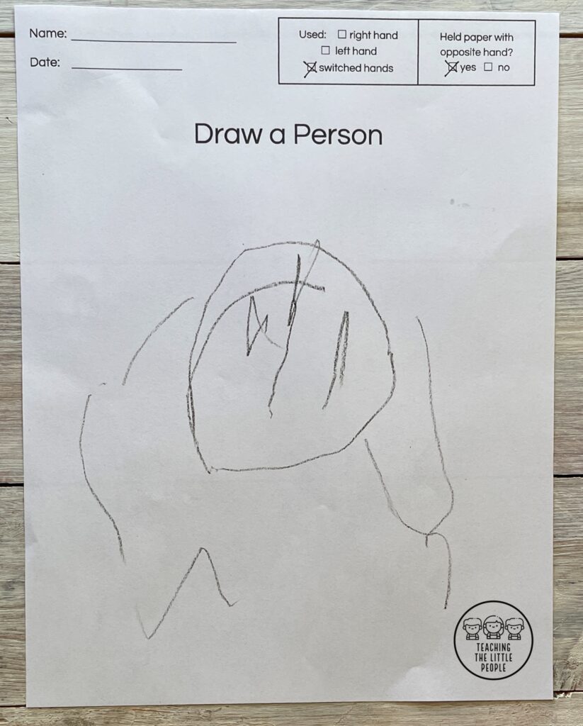 scribble-like drawing of a person done by a young child